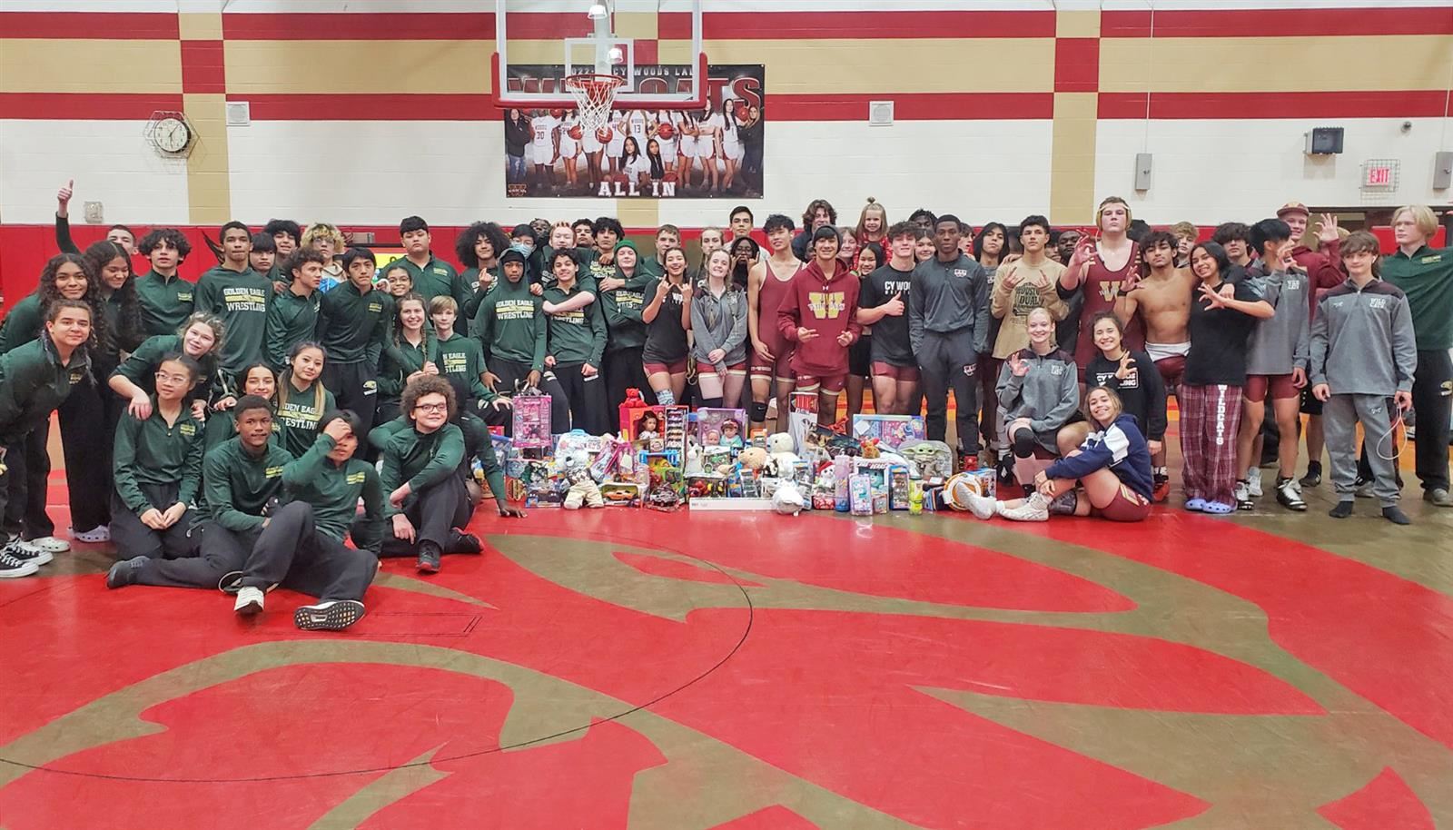 Cypress Falls and Cypress Woods wrestling participates in CALI BEAR toy drive.